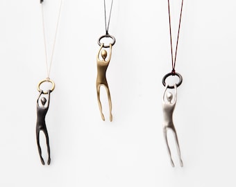 Peter and Ring, by Ariadni Kypri, silver or bronze pendant/earring (multifunctional piece) , acrobat_by ariadni Kypri _Circus collection