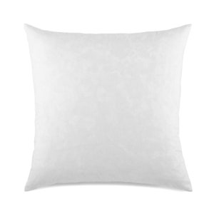 May include: A white square pillow with a soft, textured surface.