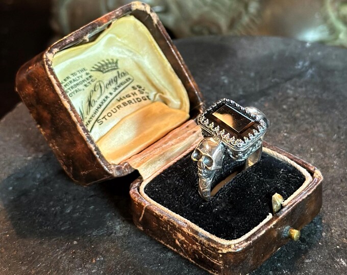 Ring in the Night — the smoky quartz with two skull outriders