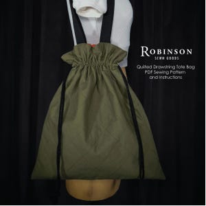 May include: An olive green quilted drawstring tote bag with black straps and black drawstring cords. The text on the image reads: Robinson Sewn Goods, Quilted Drawstring Tote Bag, PDF Sewing Pattern and Instructions. The bag has a diamond pattern.