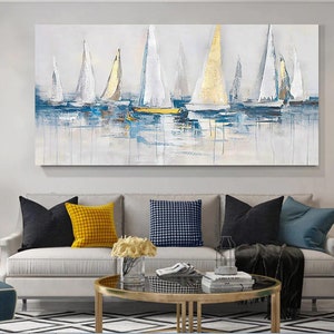 May include: Abstract painting of sailboats on a blue and white sea. The sailboats are white with gold accents. The painting is on a canvas and has a textured finish.