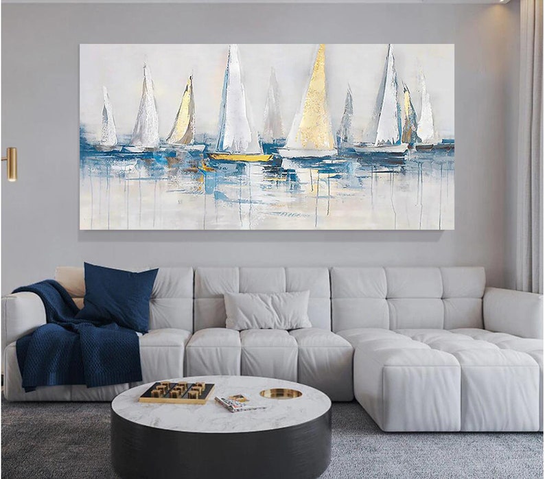 May include: A painting of sailboats on a body of water. The sailboats are white with blue accents and are sailing on a light blue body of water. The background is a light blue and white abstract design.