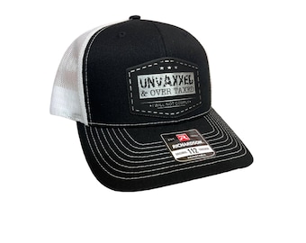 UNVAXXED & Over Taxed ™ Leatherette Patch Hat is a Richardson 112 Trucker Hat with adjustable snapback.