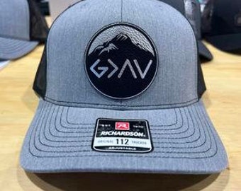 God is Greater Patch on the Richardson 112 Trucker Snap Back Hat.