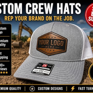 May include: A grey and white trucker hat featuring a brown leather-look patch with the text YOUR LOGO HERE. The hat has a Richardson 112 sticker on the brim. Text on the image includes CUSTOM CREW HATS, REP YOUR BRAND ON THE JOB, SALE ENDS SUNDAY, and YOUTH SIZES Available.