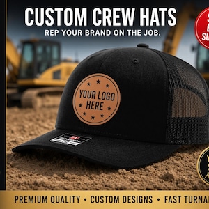 May include: A black baseball cap with a mesh back and a circular tan leather patch on the front. The patch features the text "YOUR LOGO HERE" surrounded by small stars. The cap has a flat brim with a small rectangular sticker on the top surface.