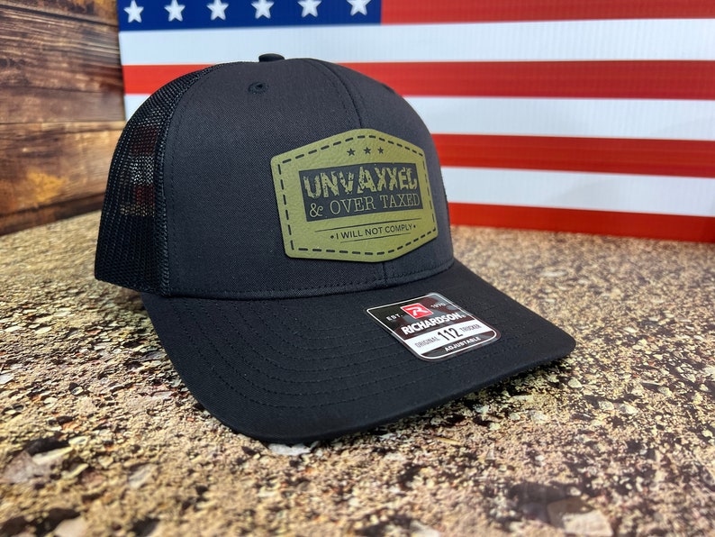 UNVAXXED & Overtaxed Richardson 112 Trucker Hat Black/Black Mesh with Green/Black Patch