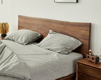 Platform bed frame made of wood. Live edge bed frames, live edge walnut beds, queen bed frames, king bed frames, walnut platform beds