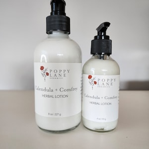 May include: Two bottles of Poppy Lane Organics Calendula + Comfrey Herbal Lotion. The larger bottle is 8 fluid ounces and the smaller bottle is 4 fluid ounces.