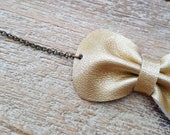 Gold Leather bow bracelet size adult or child