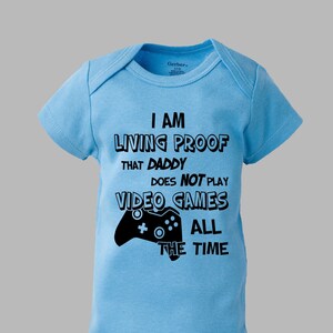 I&#39;m Proof Daddy Doesn&#39;t Play Video Games All The Time Baby Gerber Onesie Romper