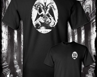May include: Black t-shirt with a white graphic of a goat-like figure with horns and wings. The graphic is in a circle with a distressed look. The text "Kinsman Trading Co. LLC" is printed in white at the bottom of the shirt.