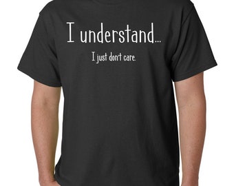 Op de afbeelding: Een zwart T-shirt met witte tekst die "Ik begrijp... Ik geef er niet om." zegt.
