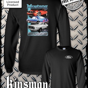 May include: Black long-sleeved t-shirt featuring a graphic of three Ford Mustang cars. The graphic includes the text "Mustang" and "Classics". The shirt also features the Ford logo.