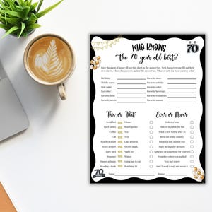 May include: A black and white printable game sheet titled "Who Knows the 70 Year Old Best?" with fill-in-the-blank questions and "This or That" and "Ever or Never" sections. A cup of coffee and a laptop are in the background.