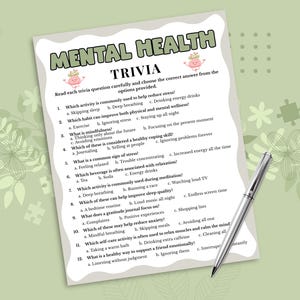 May include: A Mental Health Trivia game sheet featuring twelve multiple-choice questions about wellness, stress reduction, and mindfulness. The document has a wavy white border, green headers, and two small cartoon brain illustrations, accompanied by a silver pen.