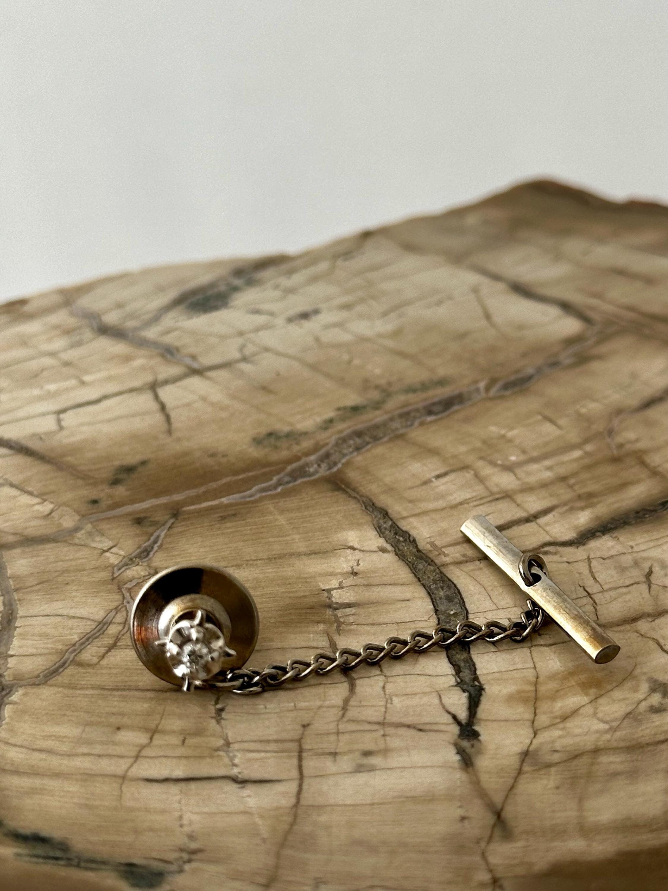 14 karat white gold and diamond tie tack