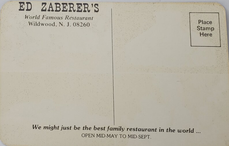 May include: A vintage postcard for Ed Zaberer's World Famous Restaurant in Wildwood, New Jersey. The postcard features the restaurant's name and address, along with the text "We might just be the best family restaurant in the world... Open Mid-May to Mid-Sept."