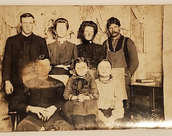 Postcard RPPC Family Photo Seven People Adults and Children DAMAGE
