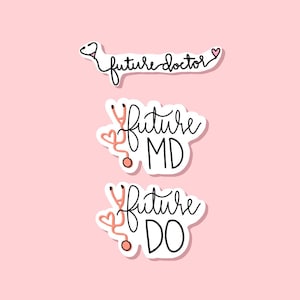 May include: Three white stickers with black outlines and pink hearts. Each sticker features a stethoscope and the text "future doctor", "future MD", and "future DO".