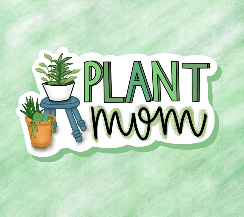 May include: A sticker with the text "PLANT mom" in black and green lettering. The sticker features a cartoon illustration of a green plant in a white pot on a blue stool.