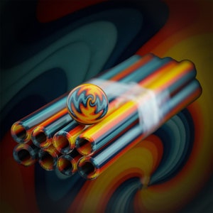 May include: A stack of colorful striped glass tubes with a swirling orange and blue glass marble on top.