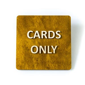 Alleen kaarten. Restaurant-, winkeldeur- of wandbord. Geen contant geld.