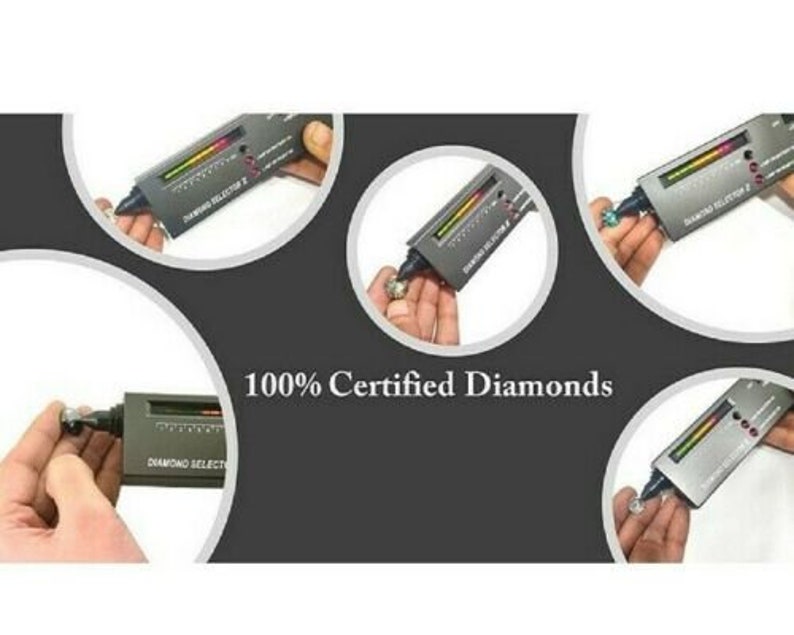 May include: A diamond tester with a digital display and the text "Diamond Selector Z" is used to test the authenticity of diamonds. The tester is held in a hand and is being used to test a diamond.