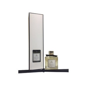 May include: A white box with a black border contains a clear glass bottle of diffuser oil with a black bow and a cork stopper. The bottle is labeled "French Pear".