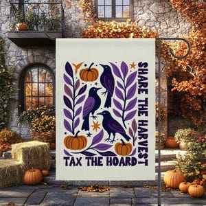 May include: A rectangular garden flag with a cream background featuring three black crows, orange pumpkins, and purple foliage. The text "SHARE THE HARVEST" is printed vertically on the right, and "TAX THE HOARD" is printed at the bottom in dark purple.