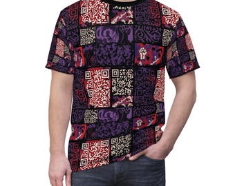 May include: A short-sleeved t-shirt with a patchwork design in shades of red, purple, and black. The pattern includes QR codes, stylized figures, and a raised fist symbol. The shirt has a black crew neck.