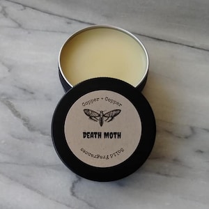 Death Moth: Solid Fragrance, Copper + Copper Nonbinary Blend. Patchouli Blend.