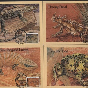 Peut inclure: Quatre timbres-poste australiens vintage représentant des reptiles et des amphibiens. Les timbres représentent un varan, un diable cornu, un lézard à langue bleue central et un crapaud crucifié. Chaque timbre a une oblitération de Dubbo, NSW, Australie.