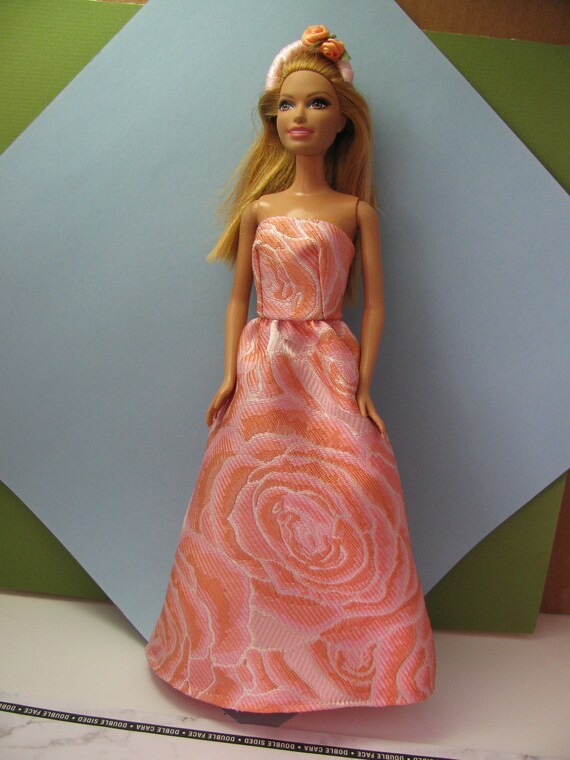 barbie doll in pink dress
