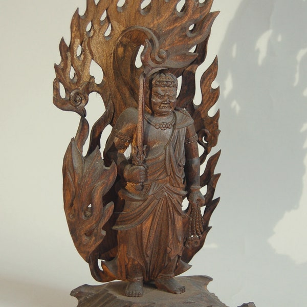 Statue of guardian deity Fudo Myoo surrounded by flames, cypress wood, Japan