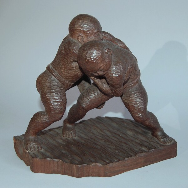 Inami sculpture, boys sumo wrestling, by Yokoyama, sugi wood, Japan