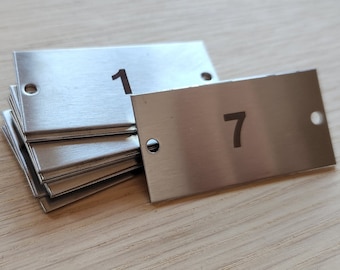 Stainless steel tag 50x25 with two holes ideal for table numbers, inventory, lockers