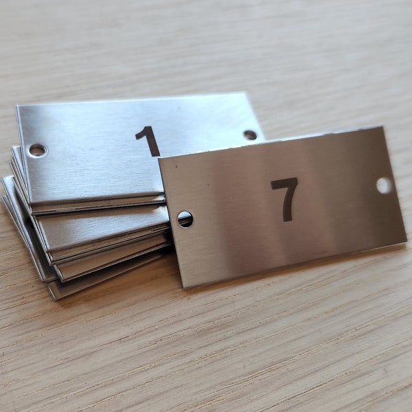 Stainless steel tag 50x25 with two holes ideal for table numbers, inventory, lockers