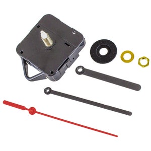 May include: Clock movement kit with black clock hands, a red second hand, and gold mounting hardware. The kit includes a black plastic clock face with a white center and a black plastic mounting ring.