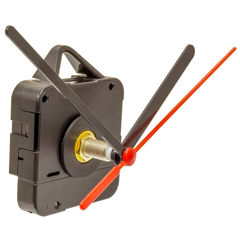 May include: A black clock mechanism with a red second hand and a black minute hand. The clock hands are attached to a black plastic clock movement.