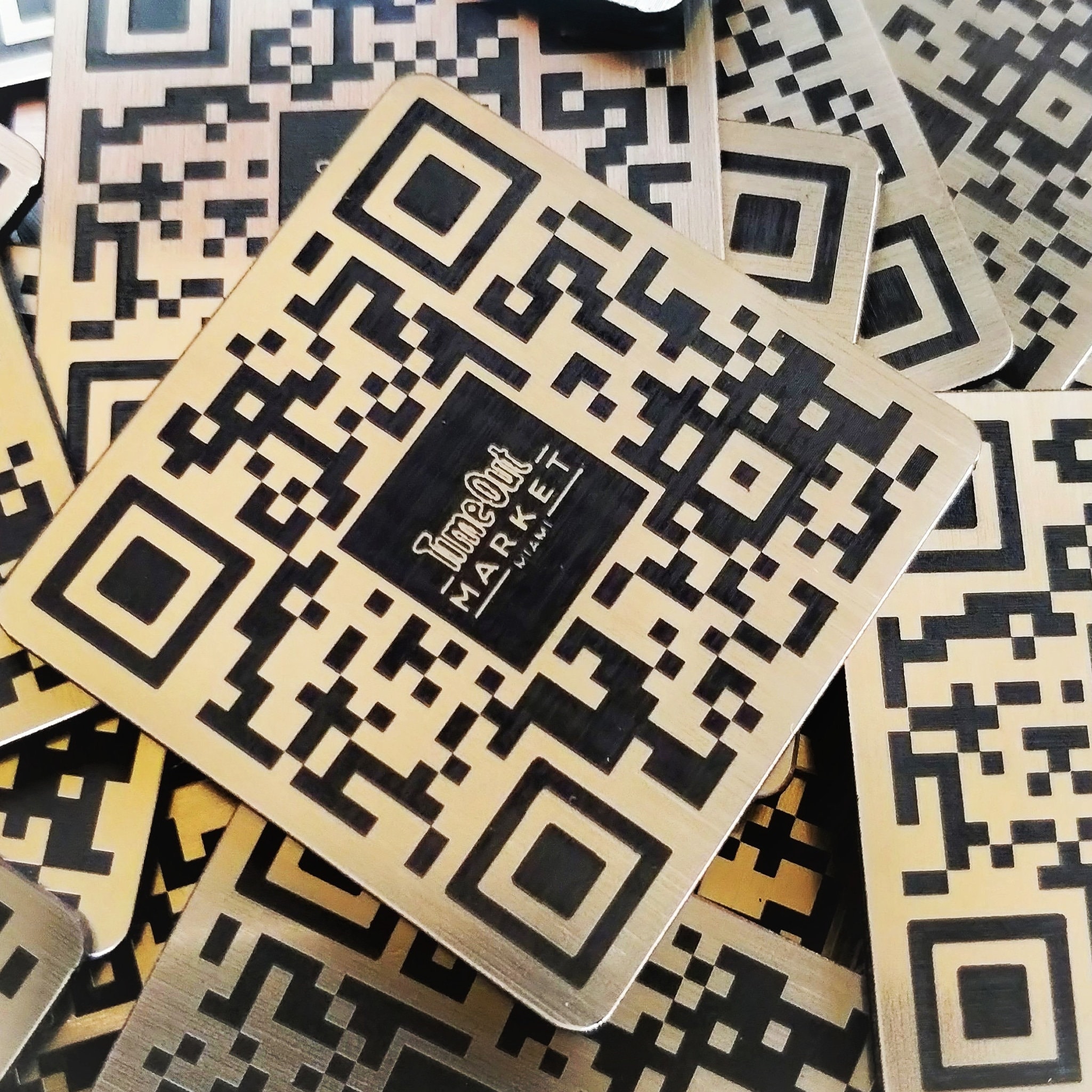 Engraved QR code tag for tables.