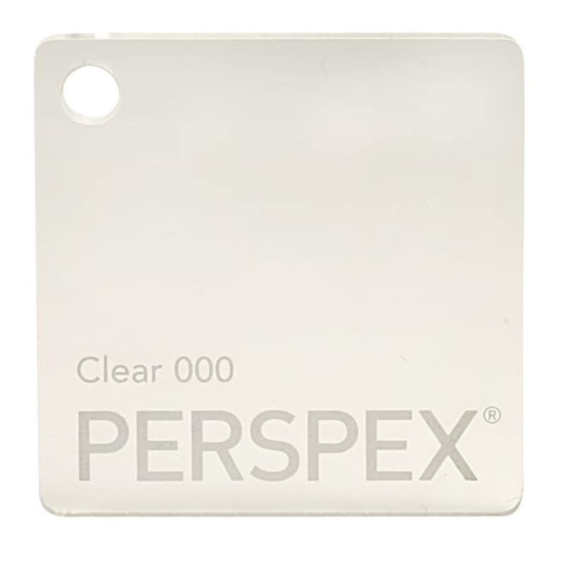 May include: A clear plastic sheet with the text "Clear 000 PERSPLEX" printed on it.