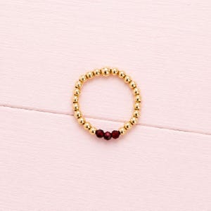 Anello impilabile con rubino: anello elastico per pollice con perline in oro 14 carati