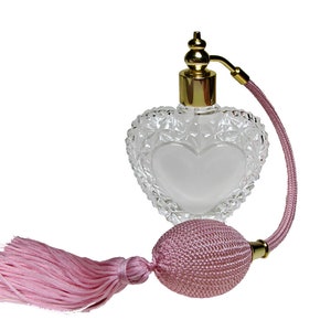 Heart Shape Crystal Glass Perfume Bottle With Bulb And Tassel Spray Mounting.