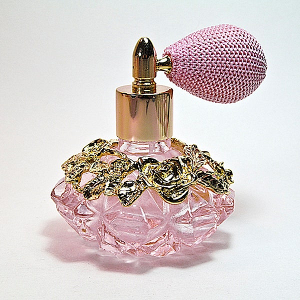 Flacon en verre de parfum en cristal rose avec fixation pour vaporisateur rose