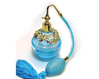 Turquoise Coloured Perfume Glass Bottle With Turquoise Bulb And Tassel Spray Attachment.