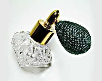 Fancy Shape Glass Perfume Bottle With Green Bulb Spray Attachment.