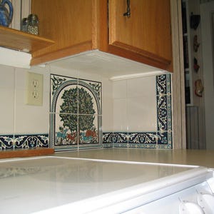 Hand-painted Tree of Life ceramic tile mural as a kitchen backsplash from the Balian Armenian Ceramics and Pottery of Jerusalem.