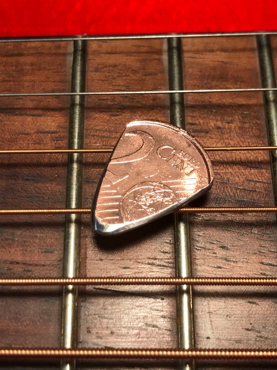 HAND CUT GUITAR PICK FROM A USA DIME TEN CENT COIN HAND CUT AND POLISHED