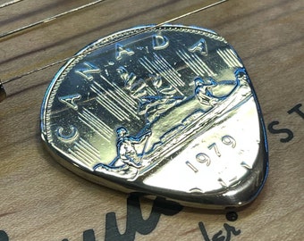 Hand Cut Guitar Pick From A Canadian Nickel Dollar